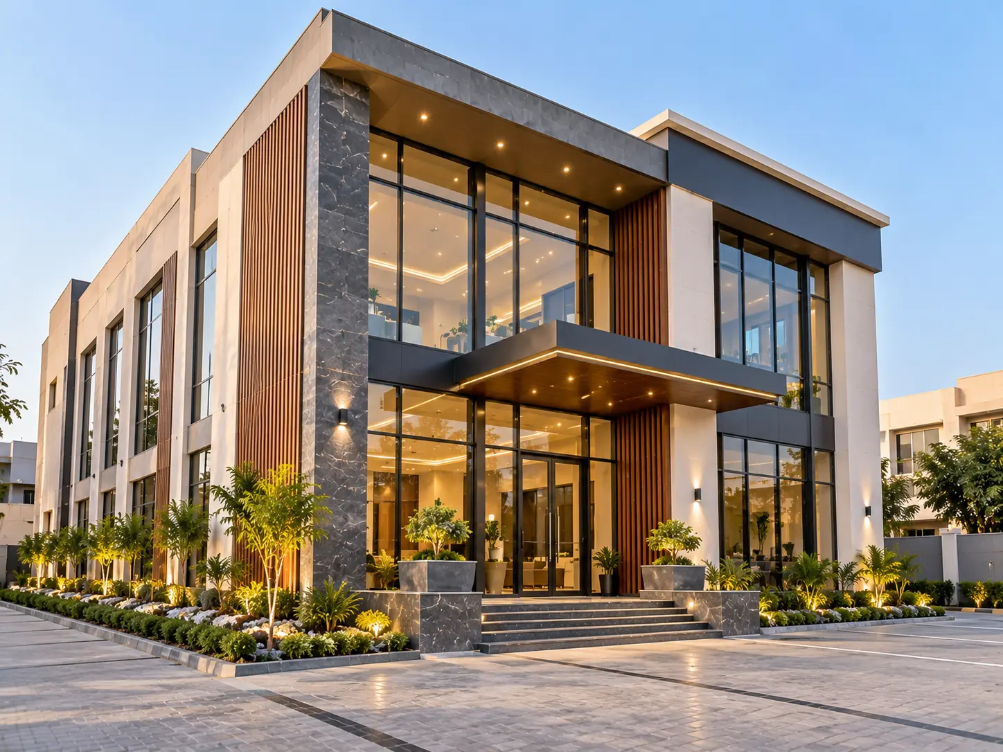 Modern commercial office building entrance at dusk